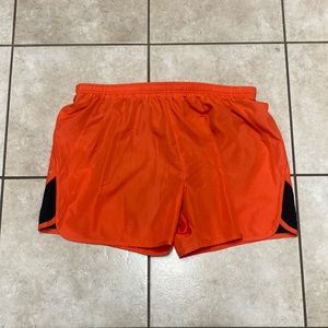 Tek Gear orange with black running shorts